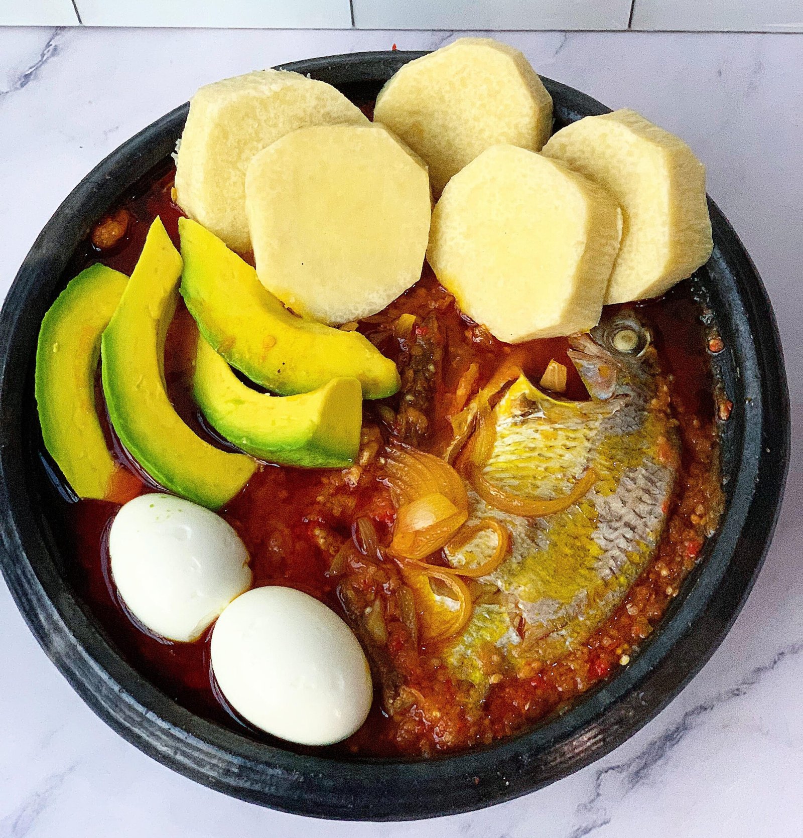 Yam and garden eggs / palava sauce